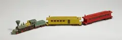 Lyonel Feininger, Lokomotive (1 Lok, 3 Waggons), 4-teiliges Holzobjekt, mit Gouache farbig gefaßt und lackiert