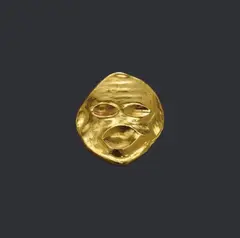 Tête by Max Ernst, Maske als Anhänger gestaltet. Gold, 23 Karat, 48,9 g. Von unregelmäßigem Umriß, Durchmesser bis zu 8 cm. Rückseitig auf , sold Nov 2006