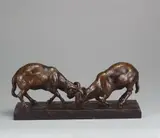 August Gaul, Kämpfende Widder, Bronzeplastik. Höhe 14,5 cm. Auf schwarzen Marmorsockel (