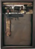 Winter-Attribut by Karl Fred Dahmen, Collage aus Polster, Holz, Lederriemen, Rosshaar, Stroh, Plastikschläuchen, Stoff und Notenblatt, sold Jun 2006