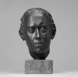 Joachim Karsch, Portrait Dr. Gertz, Bronzeplastik auf weiß gesprenkeltem grau-braunen Marmor-Sockel