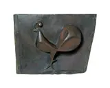 Hochrelief Hahn by Ewald Mataré, Bronze. Hochrelief auf rechteckiger Platte mit unregelmäßigem Umriß, sold Jun 2004