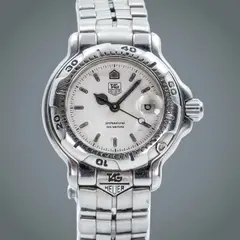 Tag Heuer, Untitled, Model: 200m Professional <br> Reference: VH1311 <br> Year: 1980s <br> Case Material: Stainless Steel <br> Case Diameter: 28mm <br> Dial: Original <br> Movement: Quartz <br> Functions: Date <br> No original box, no original papers
