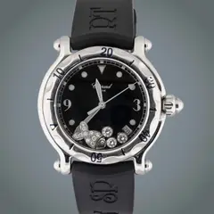 Chopard Happy Sport, Untitled, Year: 1993 <br> Movement: Quartz <br> Functions: Time only <br> Case: Stainless steel; round, fitted with sapphire <br> crystals front and back Case diameter: 39 mm <br> Bezel: Smooth <br> Dial: White, with applied Arabic numerals and <br> baton hour markers; stylised aquatic “fish” motif incorporating the maison’s signature freemoving diamonds, positioned between three sapphire crystals <br> Signature: Dial, case and movement signed <br> Strap/Bracelet: Rubber strap with pin buckle <br> No original box, no original papers