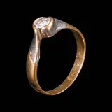 A Bypass Diamond Ring in 14k, Untitled, The ring is designed with a bypass band, centered by a diamond weighing approximately 0.25 cts. <br><br> Weighs 3.90 g. <br><br> The diamond noted as Pass on the GIA iD100®