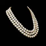 Untitled by A Classic Three-strand Pearl Necklace, The three-strand pearl necklace measures 17 inches and is joined by a silver clasp accented by smaller pearls. <br><br> , sold Apr 2026