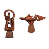 a.) Untitled b.) Untitled by Unidentified artist, b.) hardwood<br> H: 18” (46 cm)<br> L: 23 1/2” (60 cm)<br> W: 10” (25 cm), sold Apr 2026