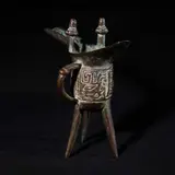 An Oriental Miniature Figurine, Untitled, brass