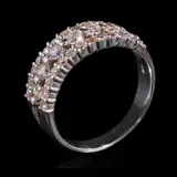 A Classic Three-row Diamond Ring, Untitled, The classic ring band in 18k features three rows of diamonds weighing approximately 0.61 cts. <br> The diamonds noted as Pass on the GIA iD100®.