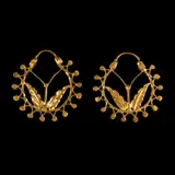 Untitled by A Pair of Creole Earrings, Set in silver and dipped in gold, the creole earrings feature nature motif., sold Jan 2026