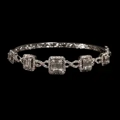 A Diamond Bangle in 18k, Untitled, A bangle in 18k white gold featuring illusion- set diamonds weighing approximately 3.00 cts.