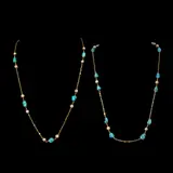 Untitled by A Set of Turquoise and Pearl Station Necklaces in 18k, The set comprises of two station necklaces in 18k yellow gold, beautifully accented with tumbled turquoise beads and pea, sold Jan 2026