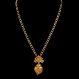 Untitled by A 14k Tamburin Necklace, The Tamburin necklace in 14k yellow gold features intricate flat-fold filigree links. It suspends a domed paisley-shaped, sold Jan 2026