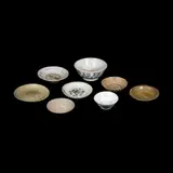 Eight Oriental Potteries, Untitled, size variable:<br> smallest:<br> H: 1 3/4” (4 cm)<br> D: 7 1/2” (19 cm)<br><br>