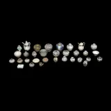 Untitled by A Thirty Two Piece Collection of Oriental Jarlets, size variable:<br> smallest<br> H: 2” (5 cm)<br> D: 2” (5 cm)<br><br>, sold Jan 2026
