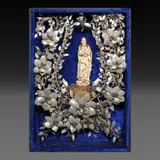 Untitled by An Ivory Debulto of La Inmaculada in a Lagang Adorned Shadow Box, ivory and mother of pearl, sold Jan 2026