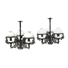 Untitled by Two 19th Century Chandeliers with Milkglass Diffusers, cast iron, sold Jan 2026