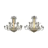 Untitled by A Pair of Circa 1970’s Eight Light Chandeliers, sold Jan 2026
