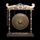 Untitled by An Old Maranao Gong, brass, hardwood, sold Jan 2026