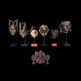 Six Masks Mounted on bases, Untitled, polychromed hardwood