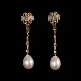 Untitled by Earrings with dangling pearls and diamonds, center stone emerald cut diamonds - 1 carat each set in 14k gold with 16 baguets and 4 round diamonds white cultured pea, sold Oct 2025