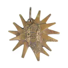 A Carved Medallion by Napoleon Abueva, brass, sold Apr 2023