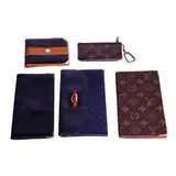 An Assortment of Five Wallets, Untitled