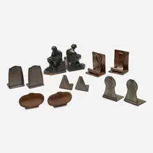 Roycroft, Collection of bookends, c. 1920, patinated and handwrought copper, patinated copper over pot metal