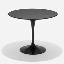 Tulip dining table, model 172 by Eero Saarinen, lacquered composite wood, enameled aluminum, sold Feb 2024