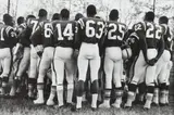 USA 1965 (aka African American Football Players Standing) by Leonard Freed, Silver gelatin print, vintage imp., offered Jun 2016