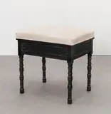 Aesthetic Movement, Piano stool, circa 1875, Ebonised wood, turned and shaped supports, upholstered rectangular seat, which hinges open to store sheet music