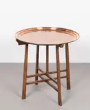 Tray table by Keswick School of Industrial Arts, circa 1900, Removeable copper circular tray decorated with flowering branches, folding oak base, sold Feb 2023