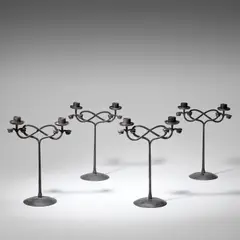 Edward Spencer, Set of four twin-branch candelabra, circa 1910, Wrought iron