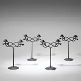 Edward Spencer, Set of four twin-branch candelabra, circa 1910, Wrought iron
