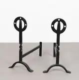 Glasgow School, Pair of firedogs, circa 1900, Iron, the upright with pierced roundels