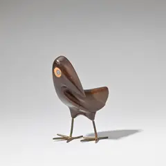 Bird by Hagenauer, circa 1950, Carved and inlaid wood, brass, sold Feb 2023