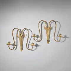 Vienna School, Pair of wall lights, circa 1915, Polished brass, each with twin-branches issuing from a fluted vase