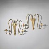 Vienna School, Pair of wall lights, circa 1915, Polished brass, each with twin-branches issuing from a fluted vase