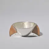 Jean Puiforcat, Small bowl, circa 1930, Inverted conical silver bowl, on rosewood supports