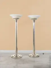 Jean Perzel, Paire de lampadaires mod. "32", A pair of '32' floor lamps in nickel-plated brass by Jean Perzel designed in 1929 and edited by Ateliers Jean Perzel
