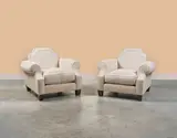 Jean-Maurice Rothschild, Paire de fauteuils club, A pair of club armchairs in fabric and wood by Jean-Maurice Rothschild circa 1940