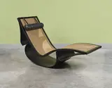 Chaise longue à bascule mod. "Rio" by Ana Maria & Oscar Niemeyer, A 'Rio' rocking lounge chair in painted plywood and caning by Ana Maria & Oscar Niemeyer designed in 1978, sold Nov 2023