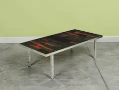 Pia Manu, Table basse, A coffee table in glazed ceramic and chrome-plated metal by Pia Manu circa 1970