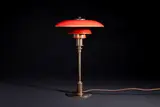 Lampe de table mod. "PH-3/2" by Poul Henningsen, A stamped 'PH-3/2' table lamp in patinated brass and red/gold painted copper by Poul Henningsen and edited by Louis Poul, offered Nov 2023