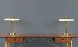 Paavo Tynell, Paire de lampes de table mod. "5061", A pair of '5061' table lamps in brass, opaline glass and painted metal by Paavo Tynell designed in 1938 and edited by Taito