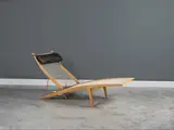 Chaise longue mod. "PP 524" by Hans J. Wegner, Wegner in oak, steel, flag halyard and leather designed in 1958 and produced by PP Møbler, offered Nov 2023