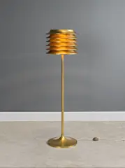 Kai Ruokonen, Lampadaire, A floor lamp in brass, cast iron, painted metal and plastic by Kai Ruokonen designed in 1952