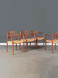 N.O. Møller, Ensemble de quatre fauteuils mod. "66", A set of four '66' armchairs in teak and rattan by N
