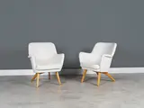 Carl-Gustaf Hiort af Ornäs, Paire de fauteuils mod. "Pedro", A pair of 'Pedro' armchairs in oak, ash and fabric by Carl Gustaf Hiort af Ornäs designed circa 1950
