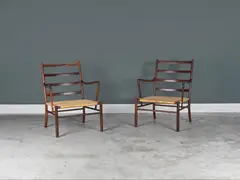 Ole Wanscher, Paire de fauteuils mod. "PJ-149" dit "Colonial", A pair of 'Colonial' armchairs in Brazilian rosewood and rattan by Ole Wanscher designed in 1949 and edited by Poul Jeppesen, early version